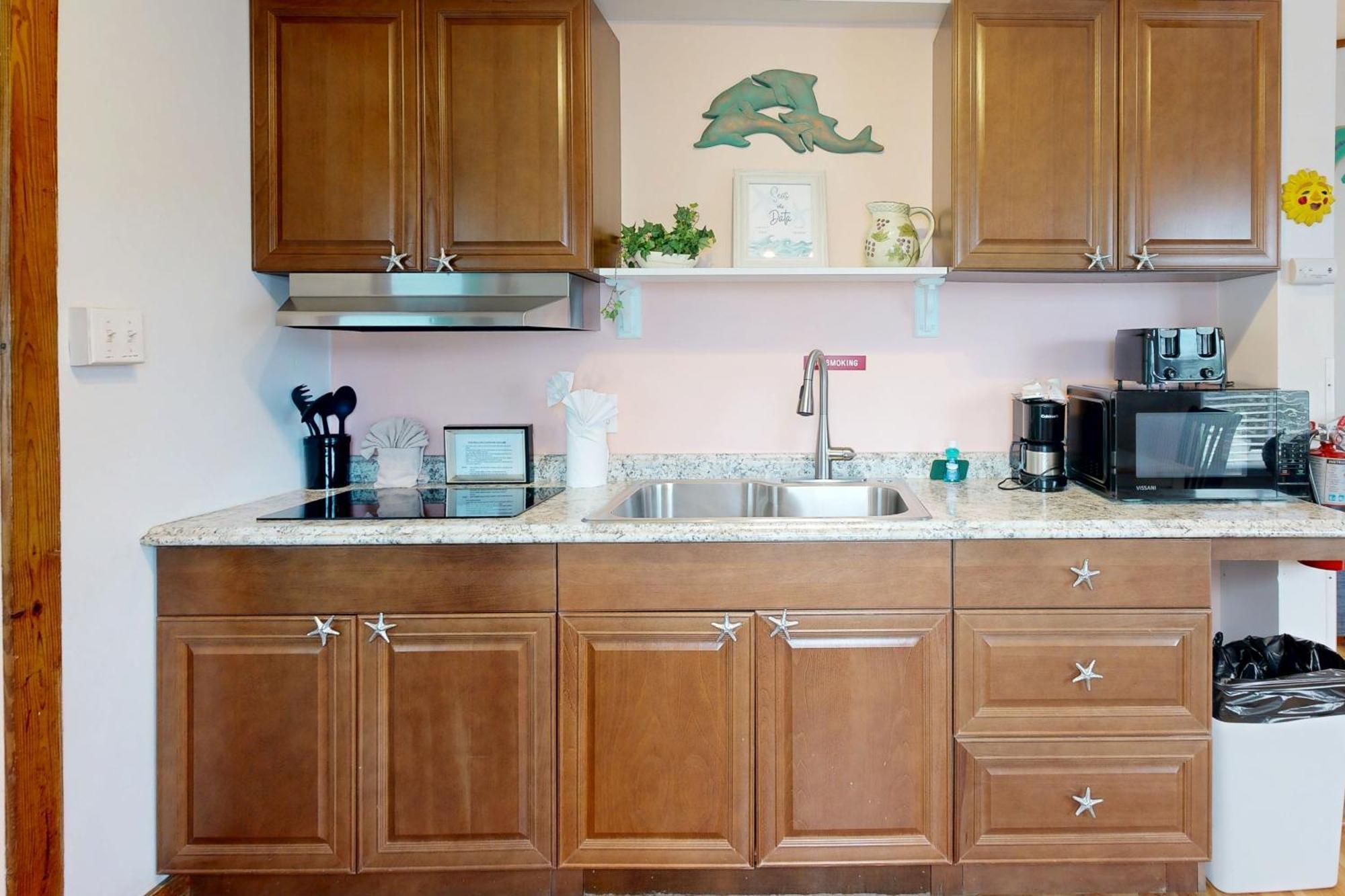 Four Flowers Guesthouse كي وست الغرفة الصورة